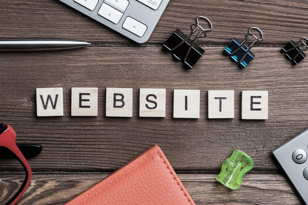 website concept flat lay on a wooden desk 2026 03 09 04 09 21 utc